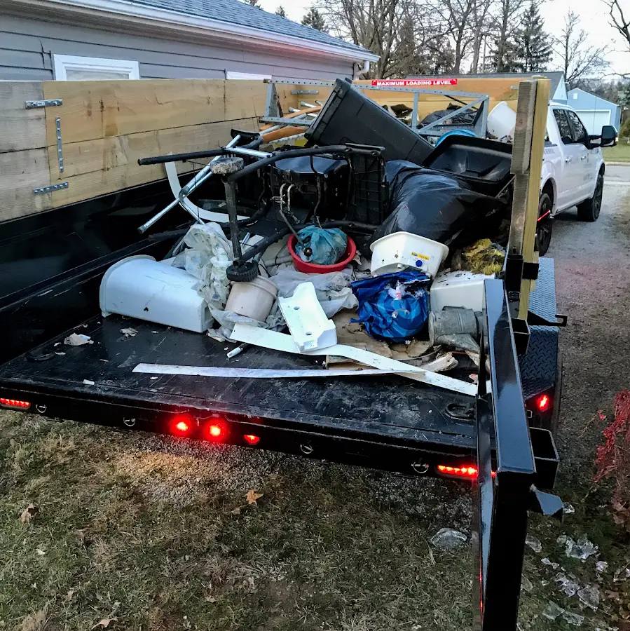 Roll-off dumpster delivered to a residential driveway in Murray