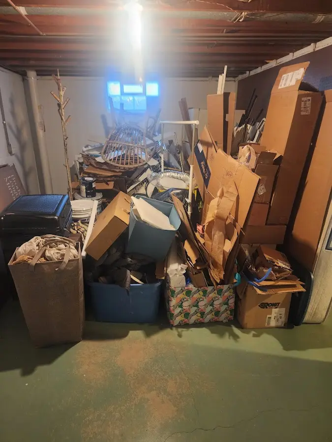 Roll-off dumpster container at job site for Yard Waste Dumpster Rental in Murray